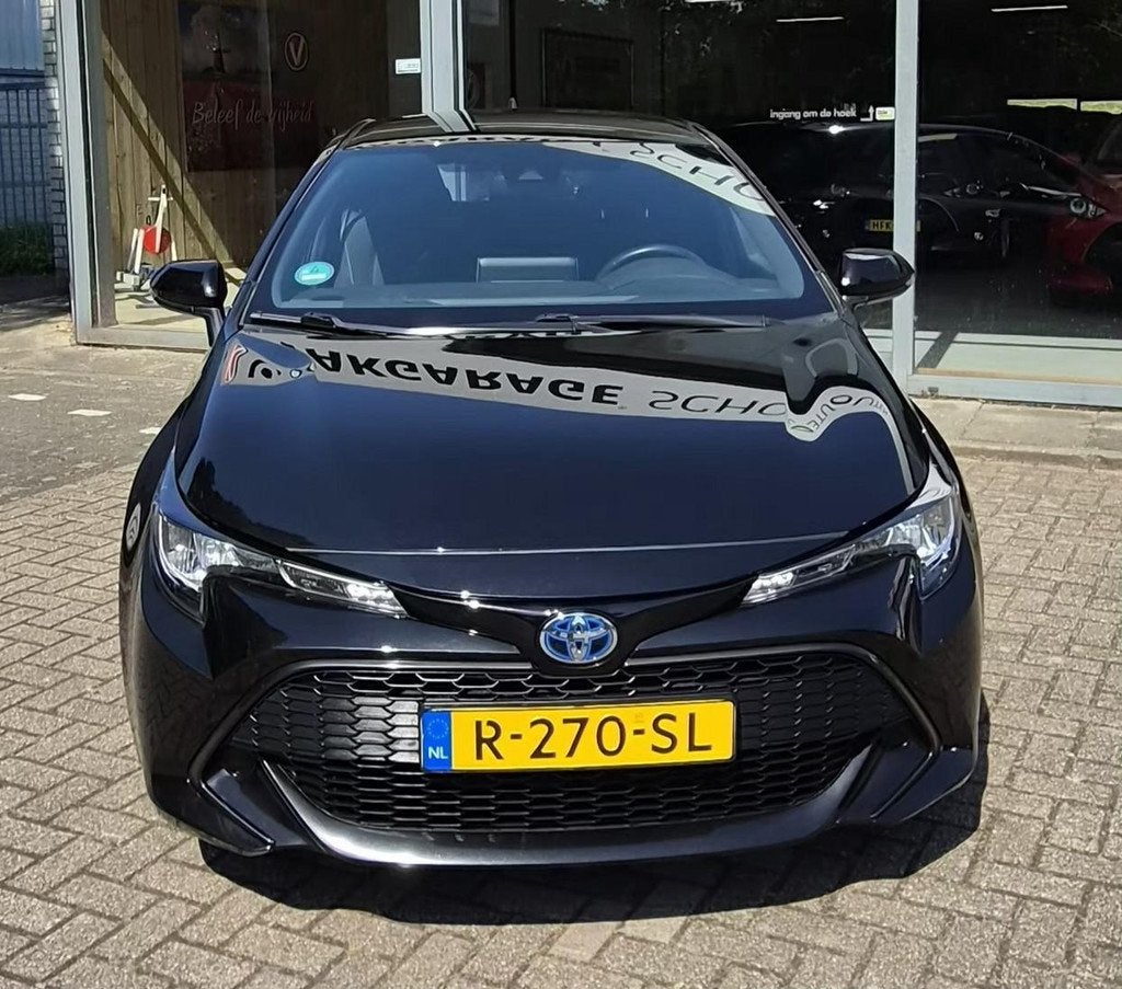 Toyota Corolla Hybrid 140 Active, Auto's, Toyota, Gebruikt, 4 cilinders, Corolla, Zwart