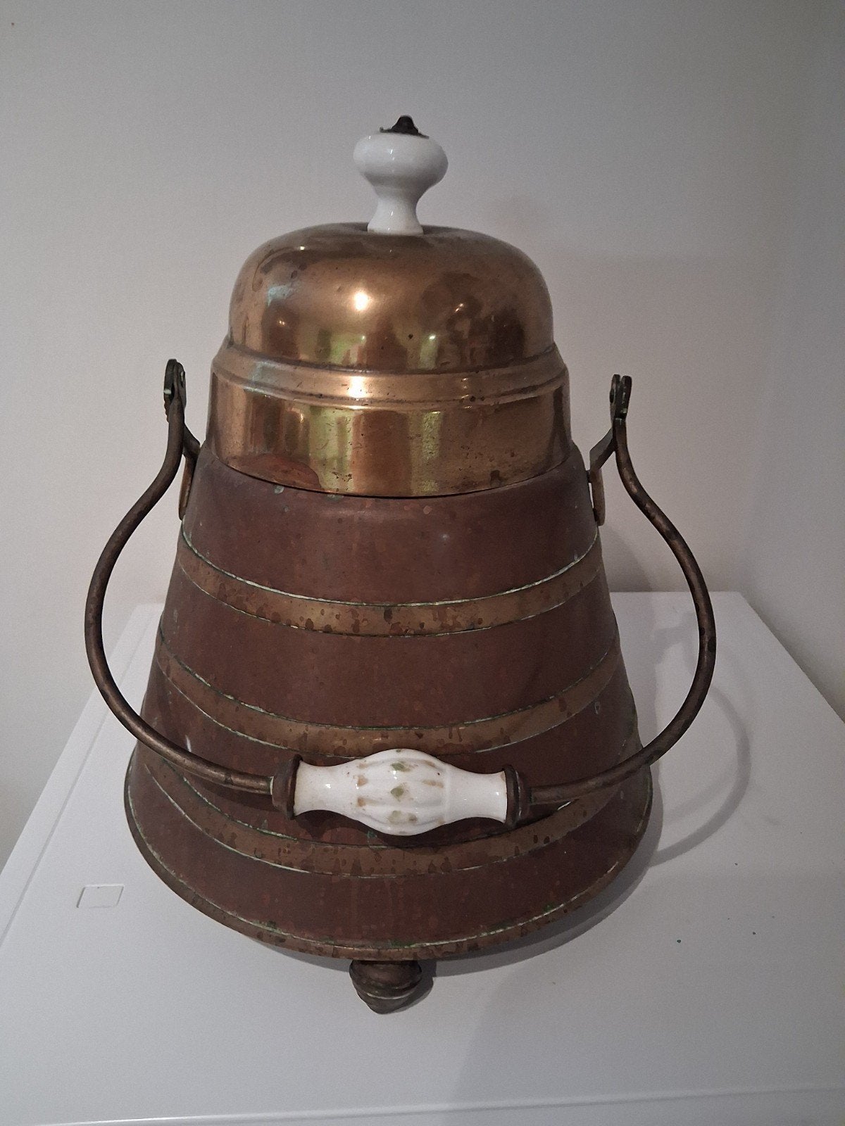 doofpot met tang, Ophalen, Koper
