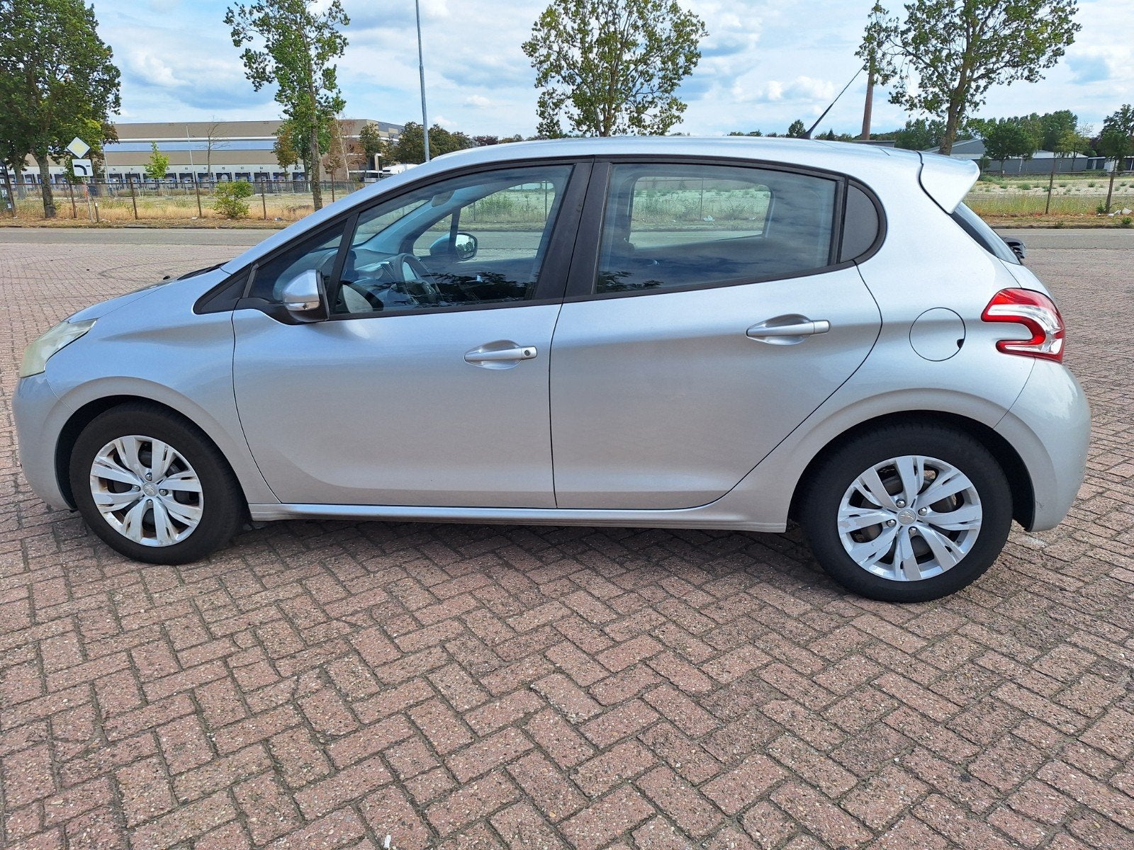 Peugeot 208 1.2 VTi 82PK 5D (102g) 2012 Grijs, Auto's, Peugeot, Voorwielaandrijving, Euro 5, Stof, 1199 cc