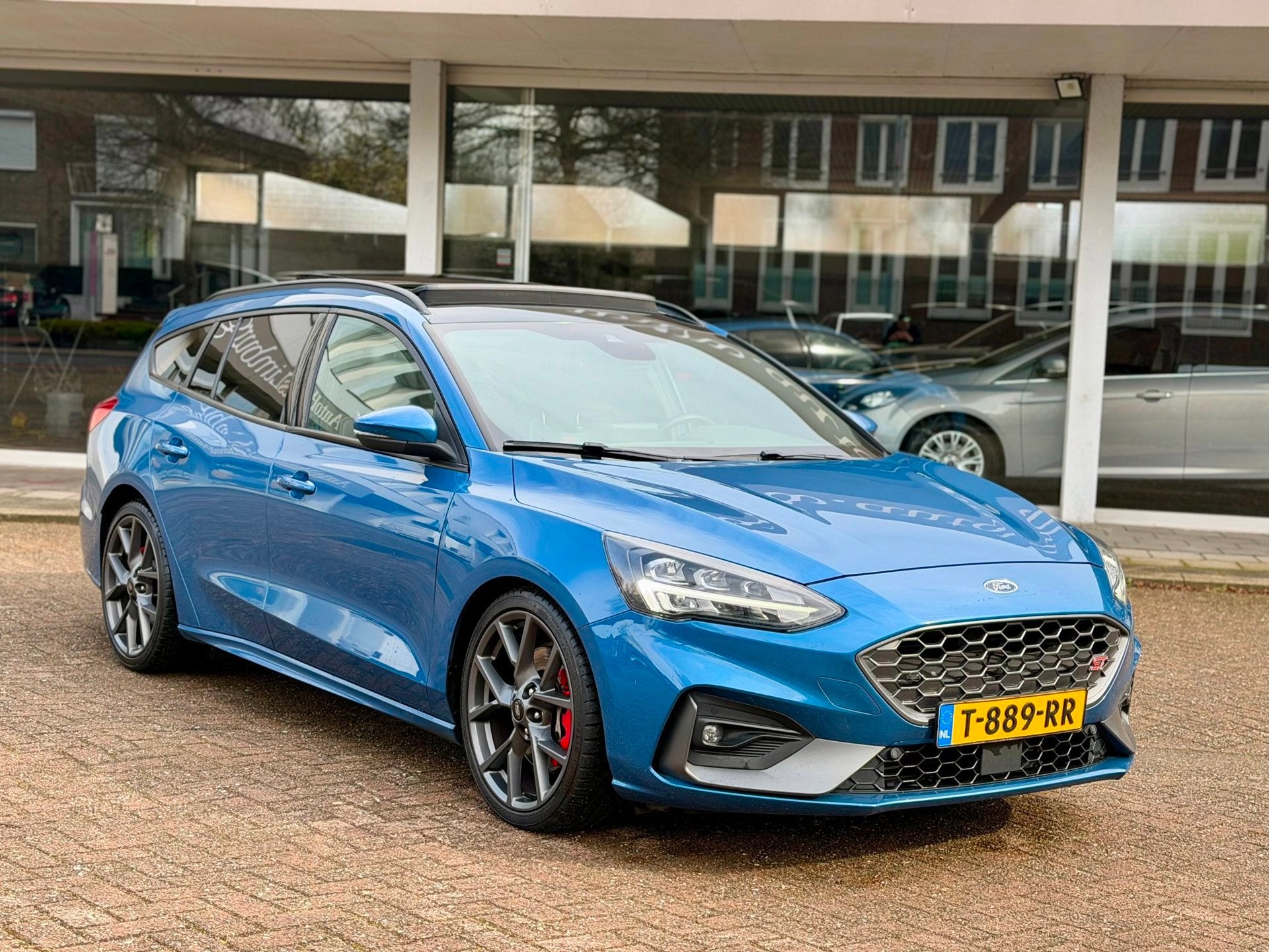 Ford Focus Wagon 2.3 EcoBoost ST-3|Pano|B&O|Dealer onderhoud, Auto's, Dealer onderhouden, Gebruikt, 4 cilinders, Blauw