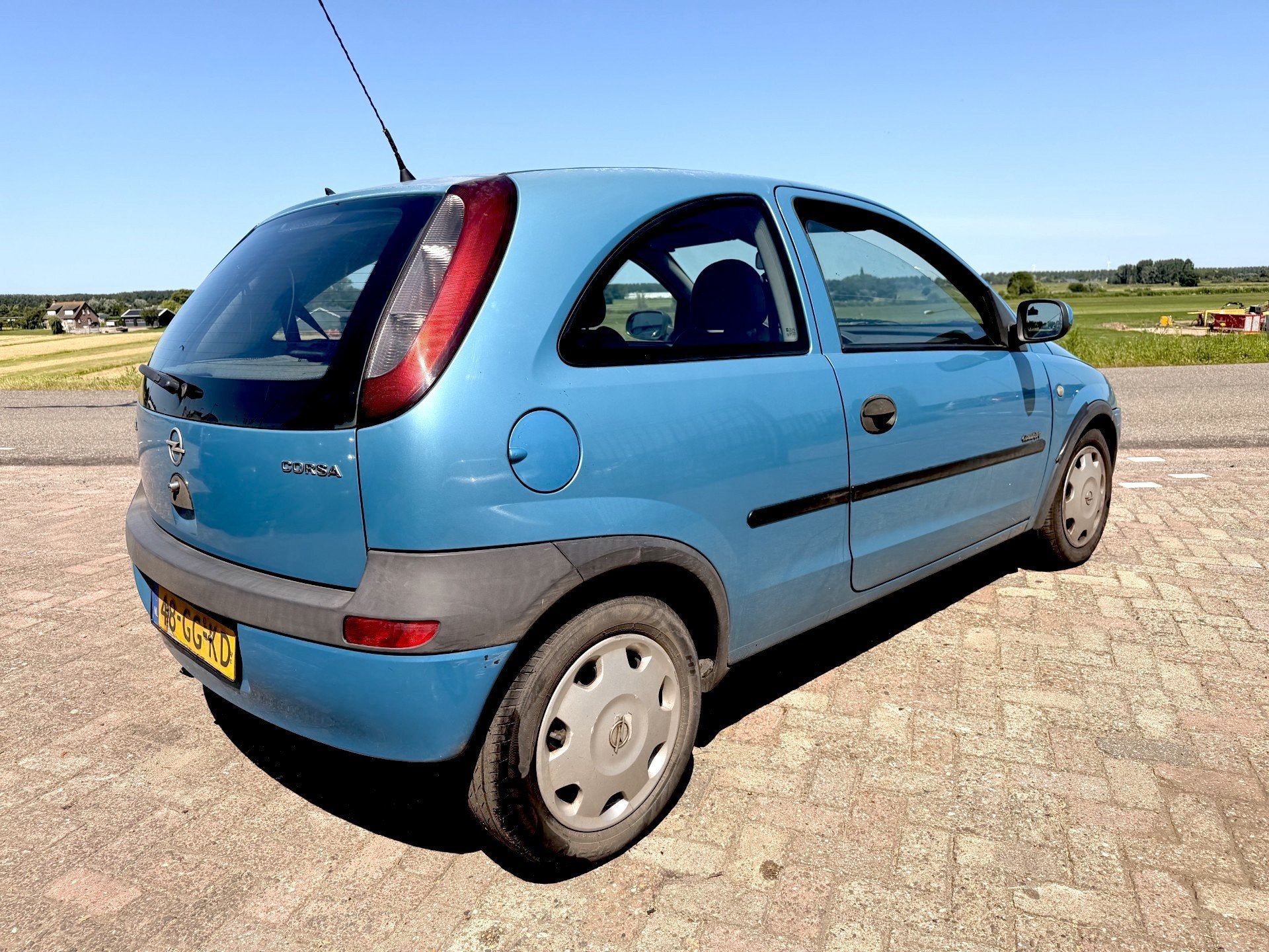 Foto 6 van Opel Corsa 1.0-12V Comfort LAGE KM's 156346 NAP auto is rijb