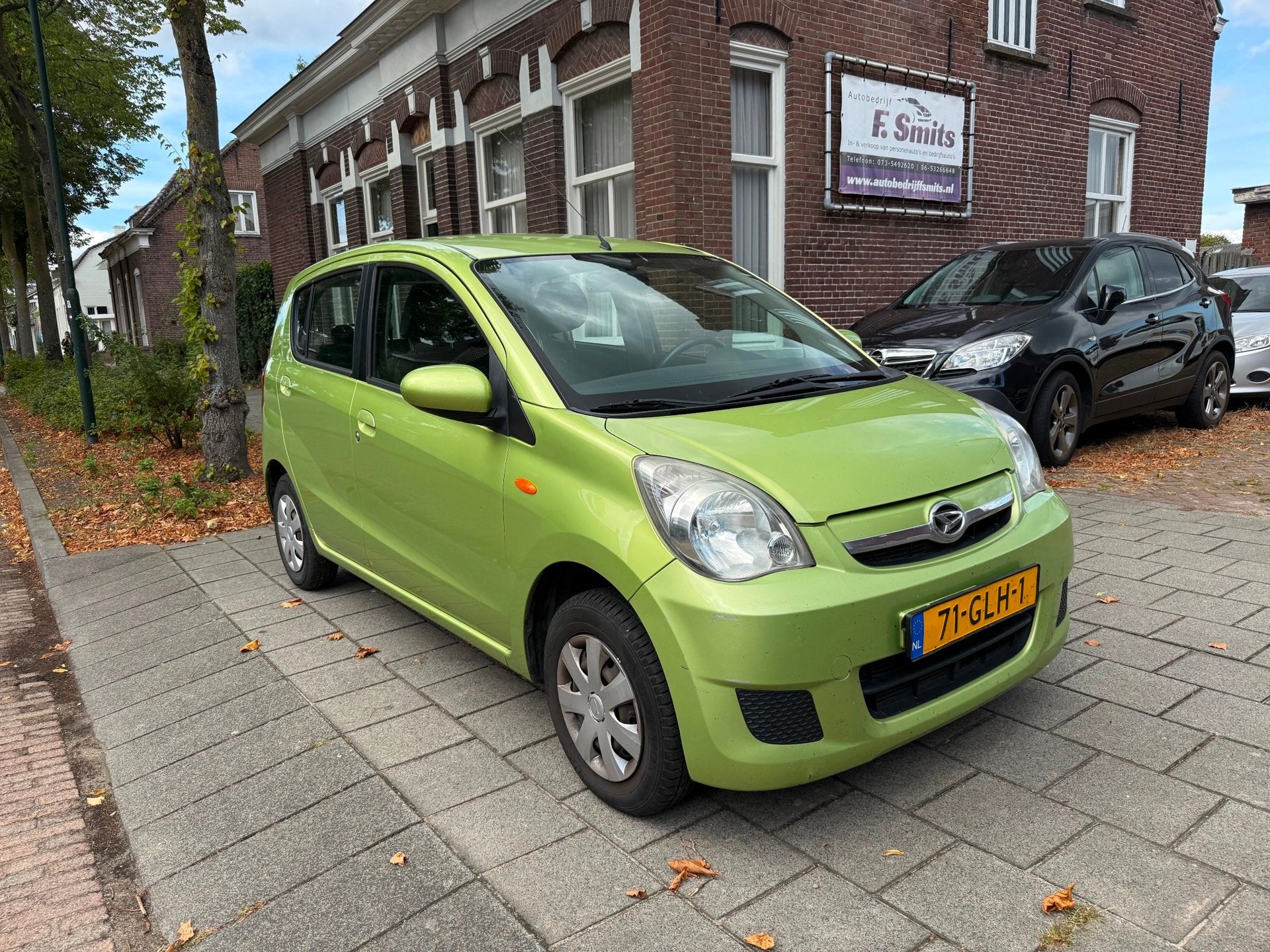 Daihatsu Cuore 1.0 Premium AIRCO GOED ONDERHOUDEN VEEL BEEN, Auto's, Voorwielaandrijving, Zwart, 4 stoelen, Cuore