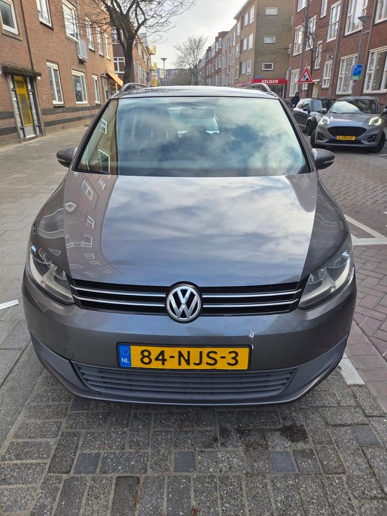 Volkswagen Touran 1.2 TSI 77KW BMT 2010 Grijs, Auto's, 730 kg, 4 cilinders, Origineel Nederlands, 75 €/maand