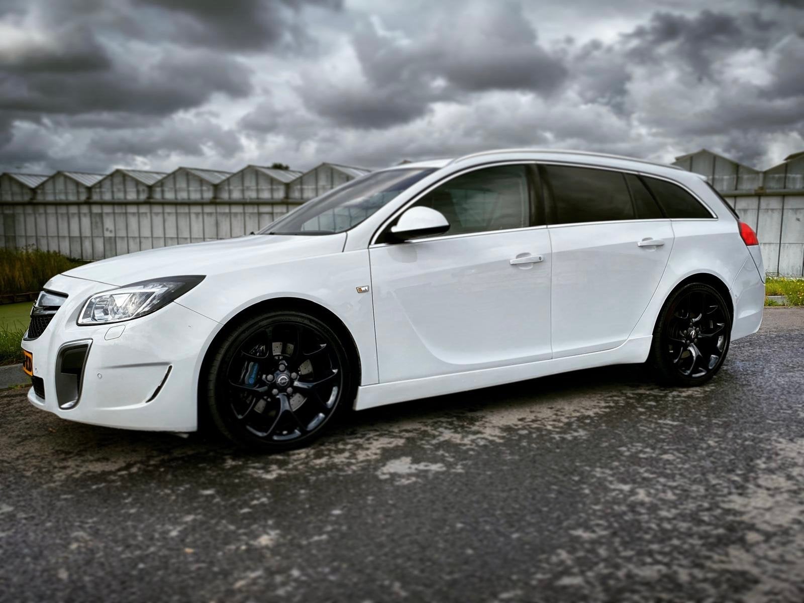 Opel Insignia Sports Tourer OPC,  2.8 V6 Turbo 4x4, Auto's, Zwart, Wit, Leder, Stationwagon