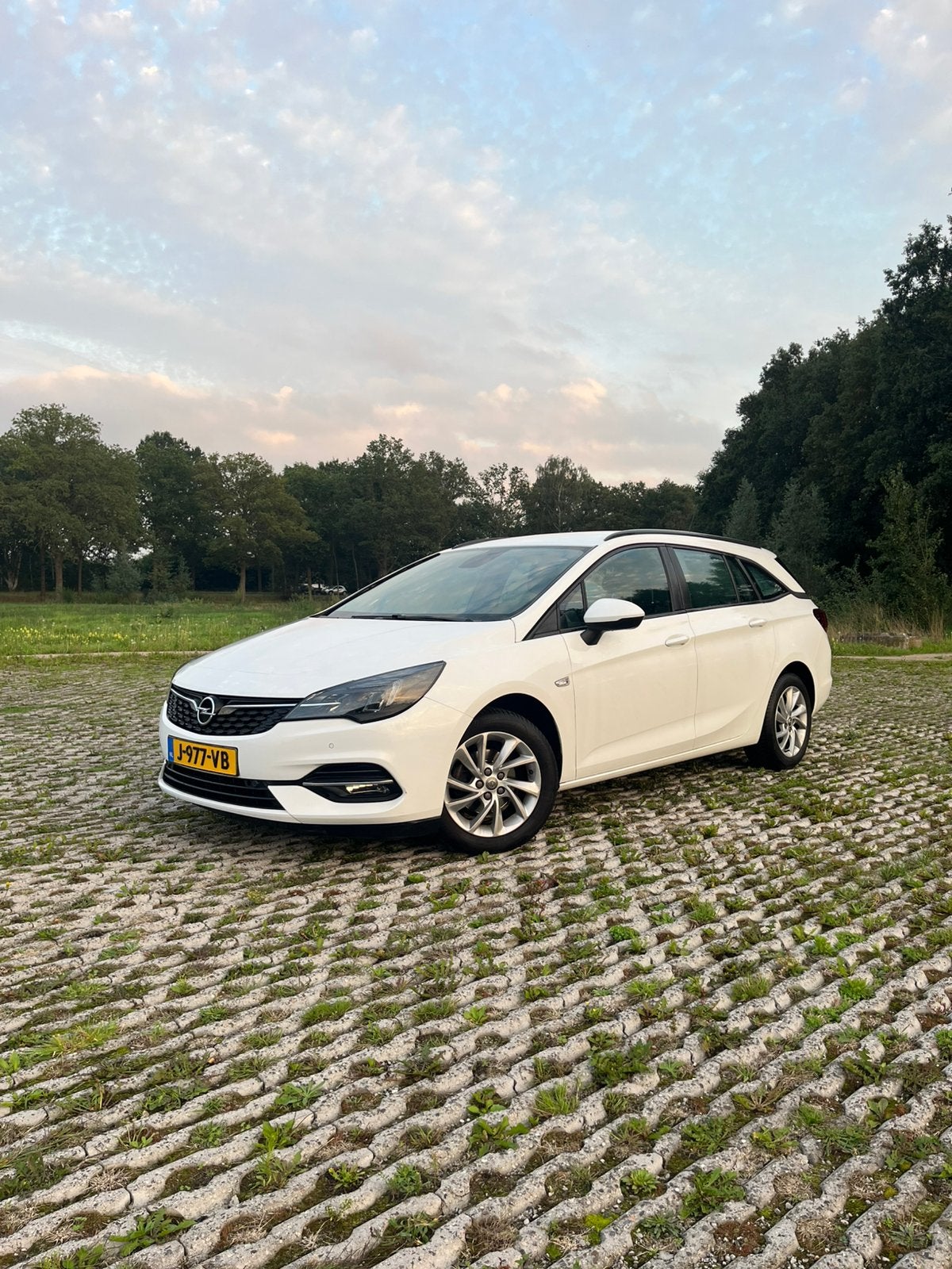 Opel Astra 1.2 Turbo 110pk Start/stop 2020 Wit, Auto's, Voorwielaandrijving, Stof, Zwart, 1199 cc