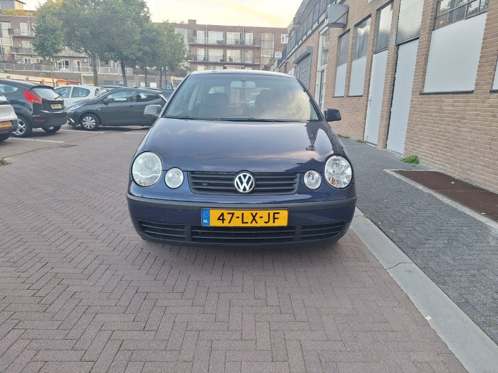 Volkswagen Polo 1.4 55KW 2003 Blauw, Auto's, Voorwielaandrijving, Stof, Zwart, 4 cilinders