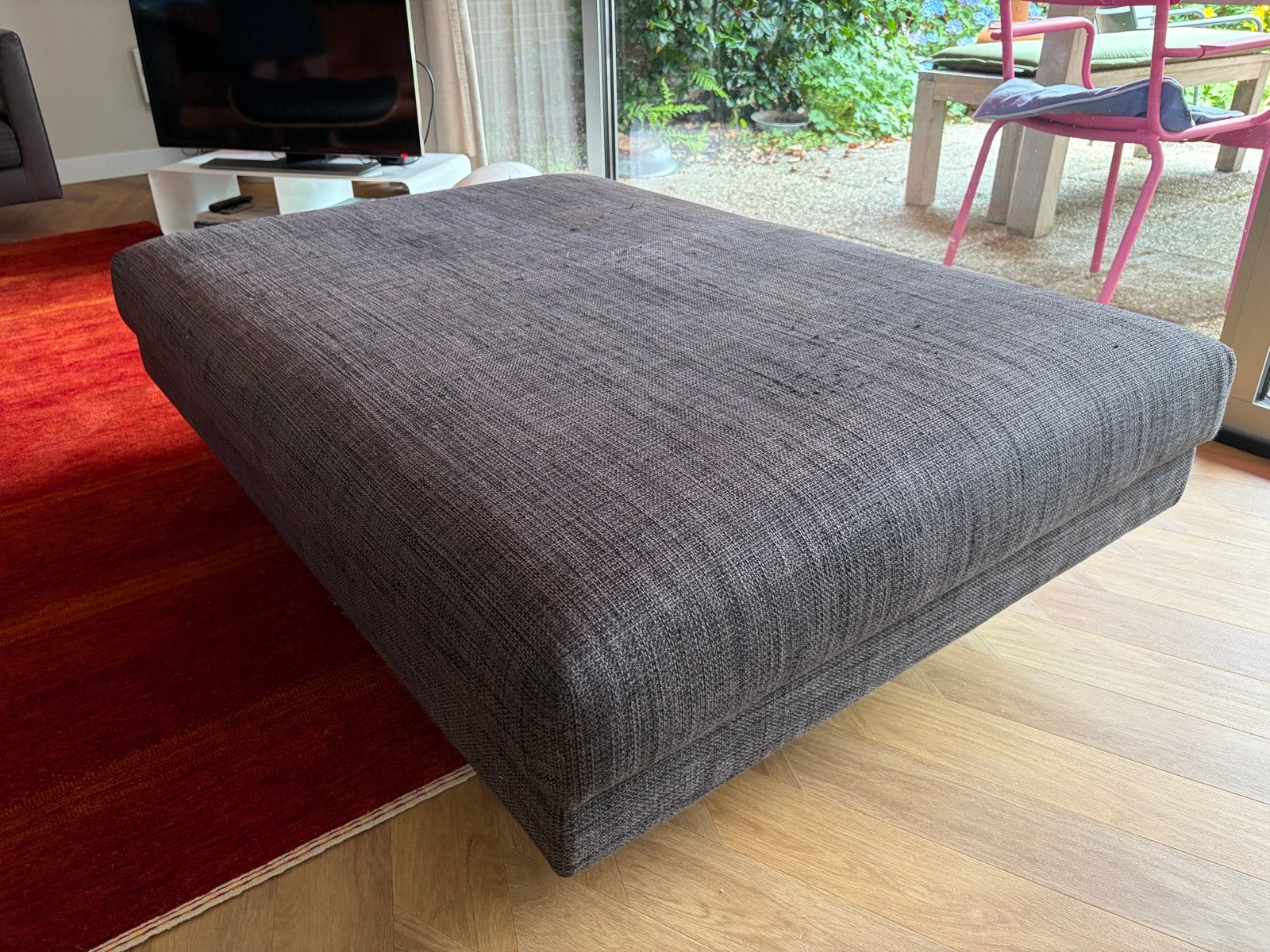 Montis axel donkergrijze hocker/poef, Huis en Inrichting, Banken | Voetenbanken en Poefen, Ophalen, Gebruikt, 100 tot 125 cm, 75 tot 100 cm