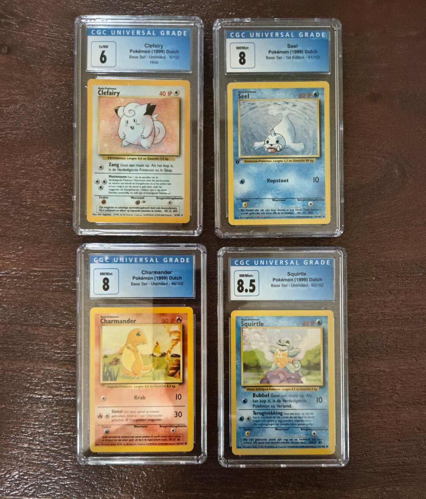 CGC Graded Pokémon: Clefairy, Seel, Charmander, Squir, Ophalen of Verzenden, Gebruikt, Meerdere kaarten, Foil