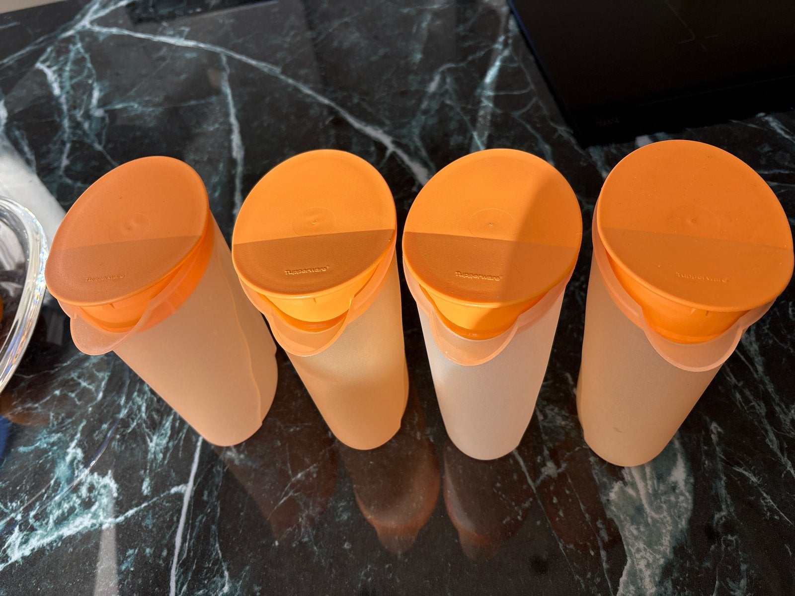 Set van 4 Tupperware drinkflessen/kannen - Oranje, Beker of Kan, Oranje, Ophalen of Verzenden, Zo goed als nieuw