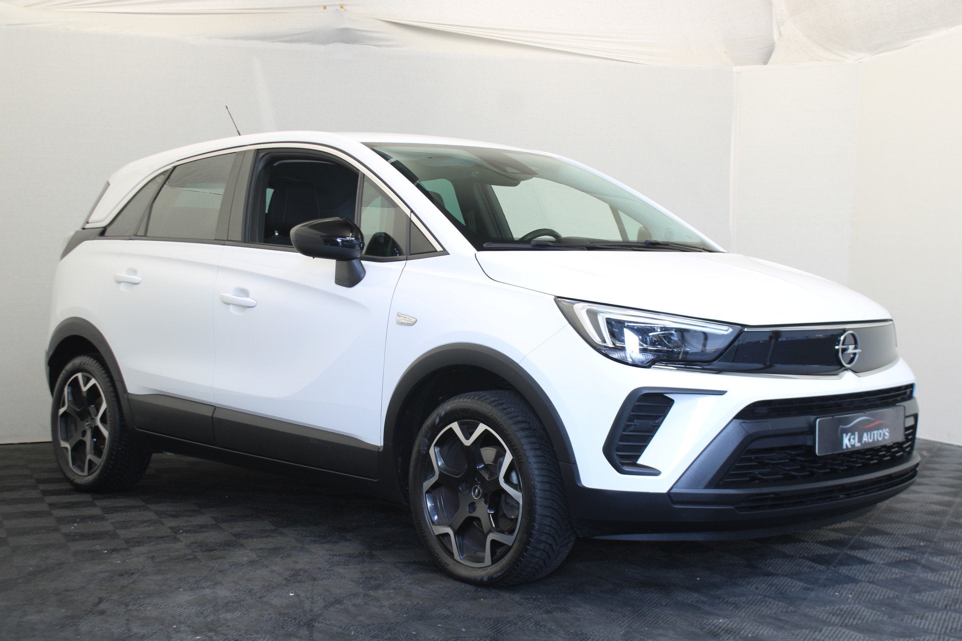 Opel Crossland 1.2 Turbo Elegance (bj 2023), Auto's, Gebruikt, 1199 cc, Wit, Bedrijf