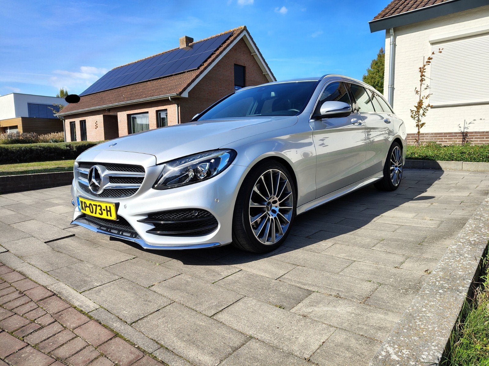 Mercedes-Benz C180 Estate AMG Line 96.000 km, Automaat, Achterwielaandrijving, 1800 kg, Zwart