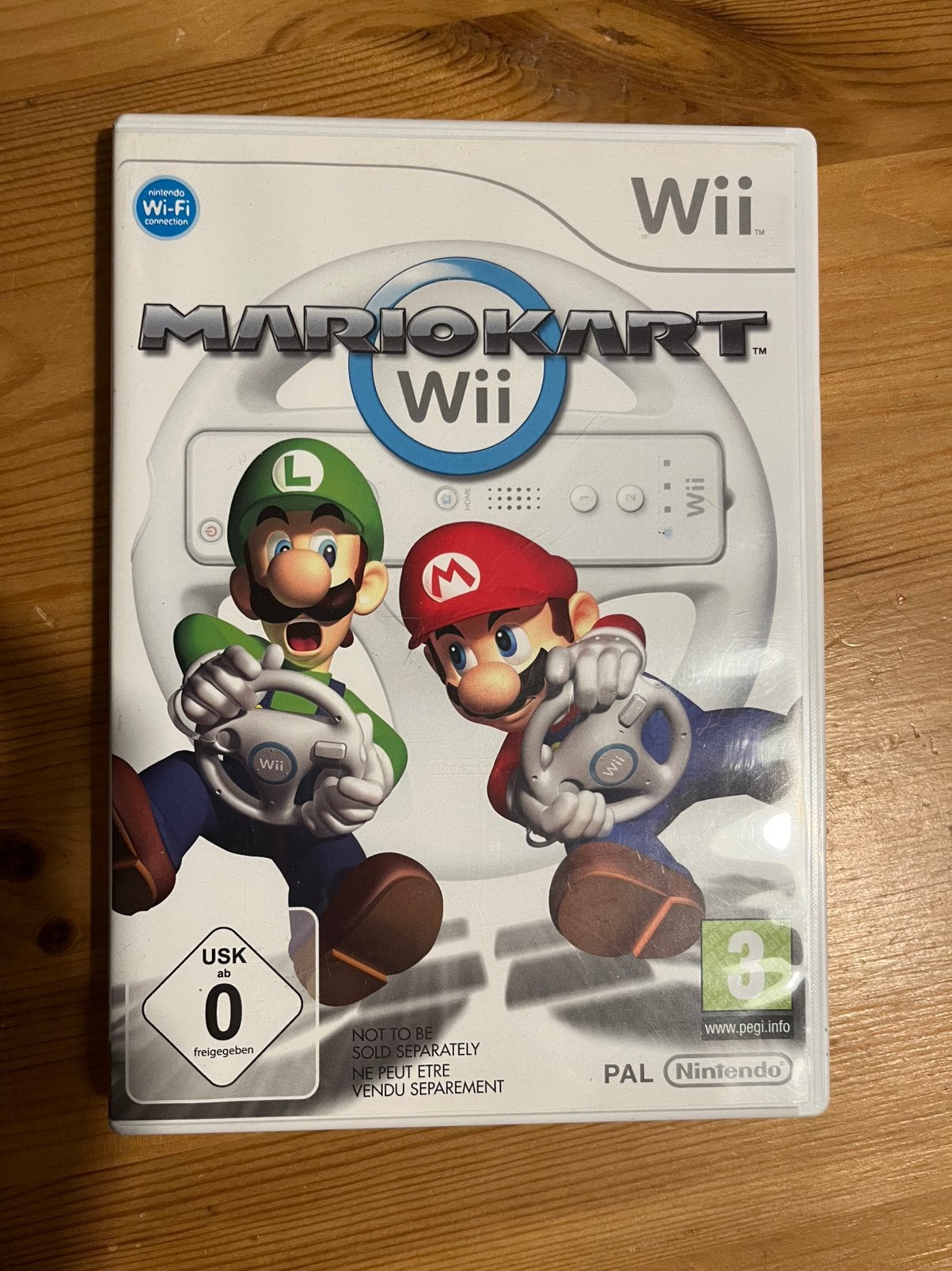 Mario kart wii + twee stuurtjes, Spelcomputers en Games, Games | Nintendo Wii, Racen en Vliegen, Ophalen of Verzenden, Zo goed als nieuw