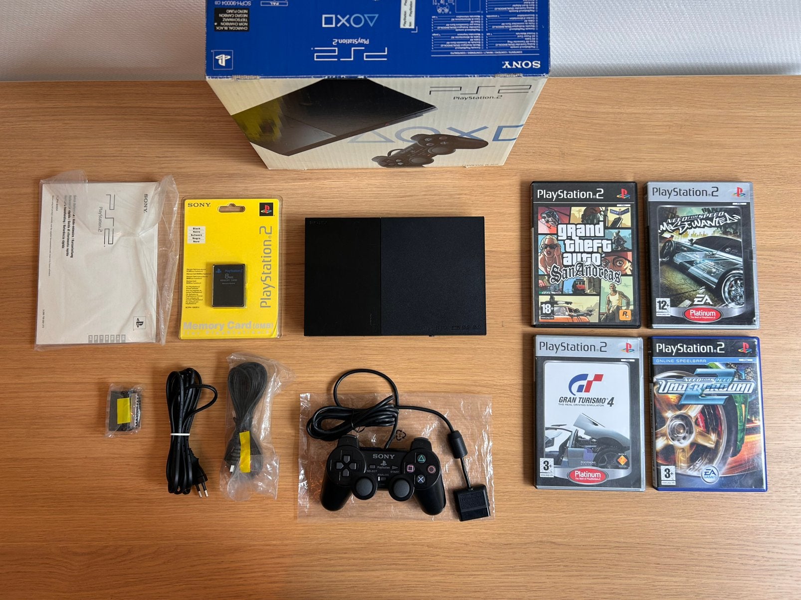 Sony PlayStation 2 Slim (SCPH-90004CB) in doos - CIB, Zwart, Met games, Ophalen of Verzenden, Zo goed als nieuw