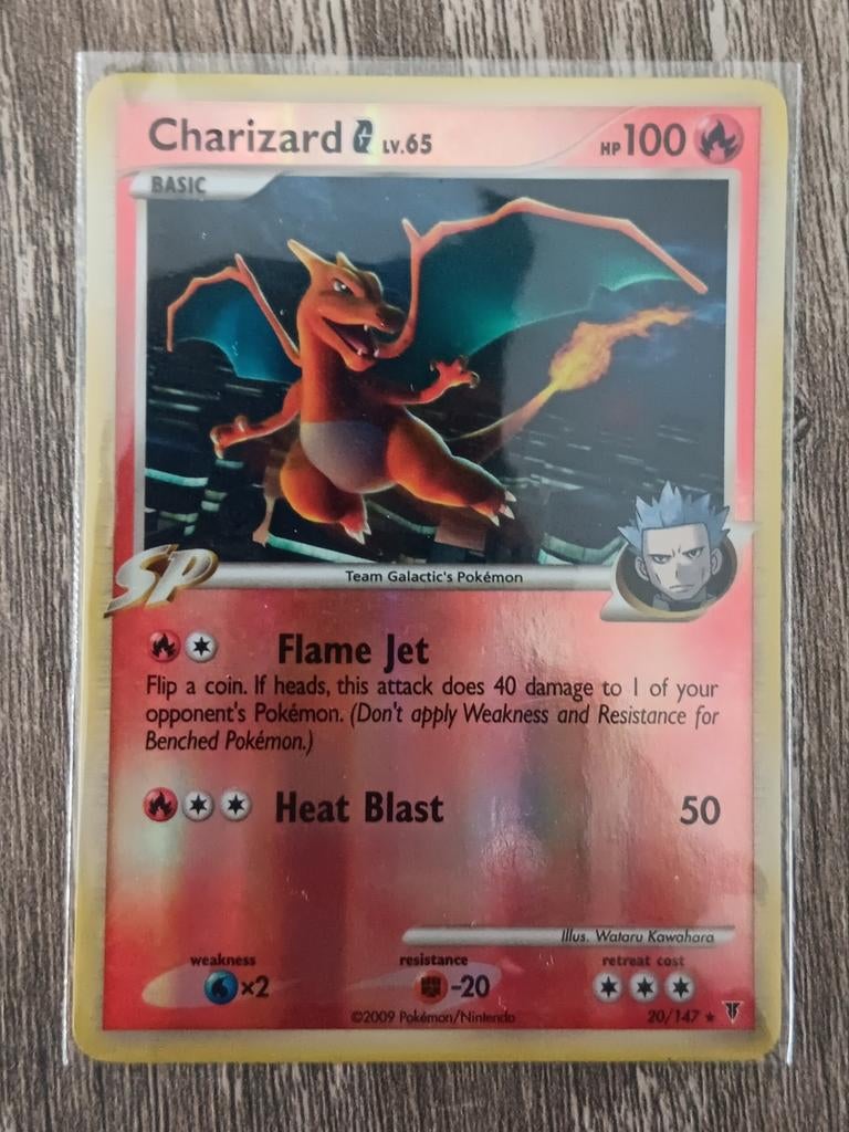 Charizard [G] lv.65 rev. Holo, Ophalen of Verzenden, Zo goed als nieuw