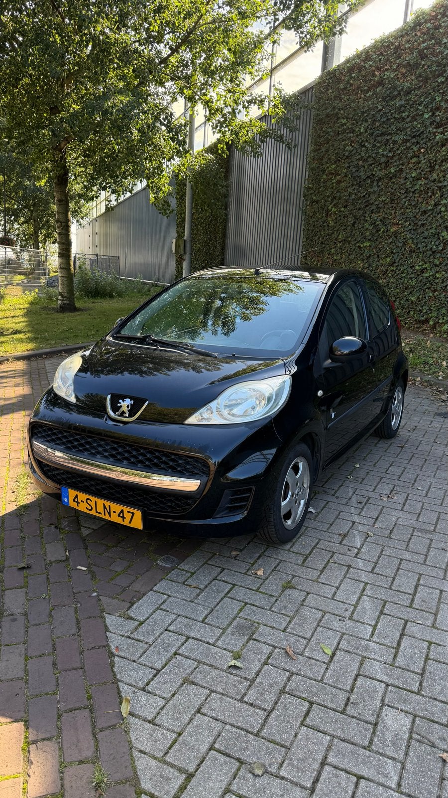 Peugeot 107 1.0 12V 5DR 2009 Zwart airco, Auto's, Voorwielaandrijving, Dealer onderhouden, Zwart, USB
