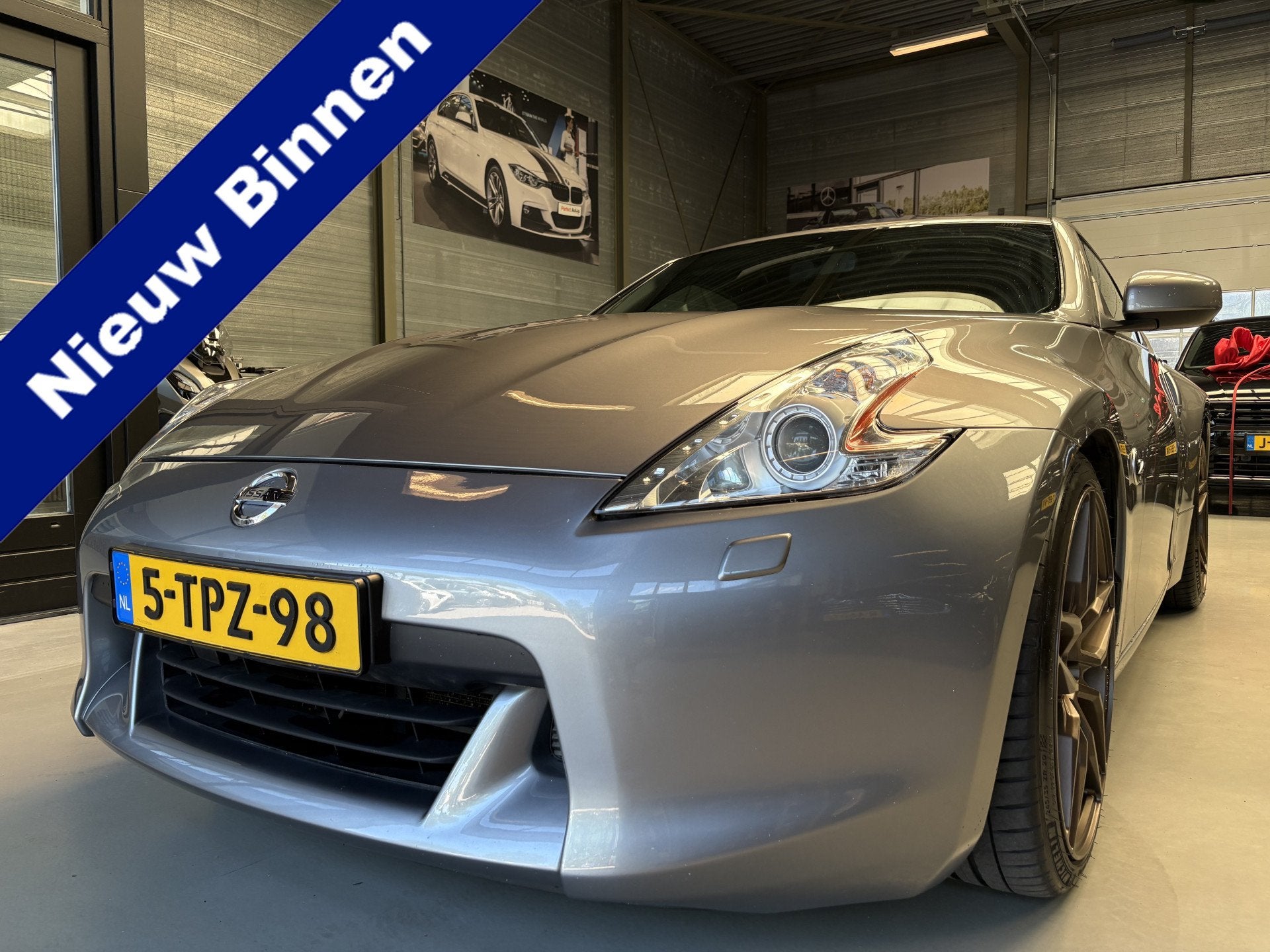Nissan 370Z 3.7 V6 Pack Bose, Cruise, Navi (bj 2012), Auto's, Automaat, Achterwielaandrijving, Gebruikt, Zwart