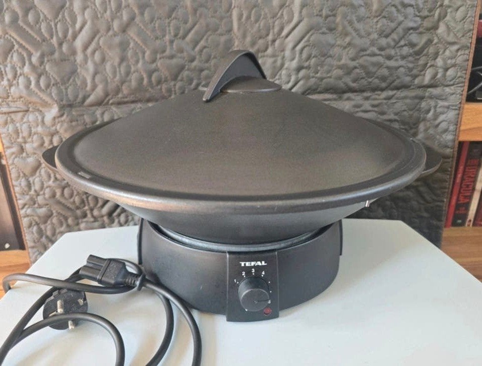 Tefal Wokpan Elektrisch, Ophalen