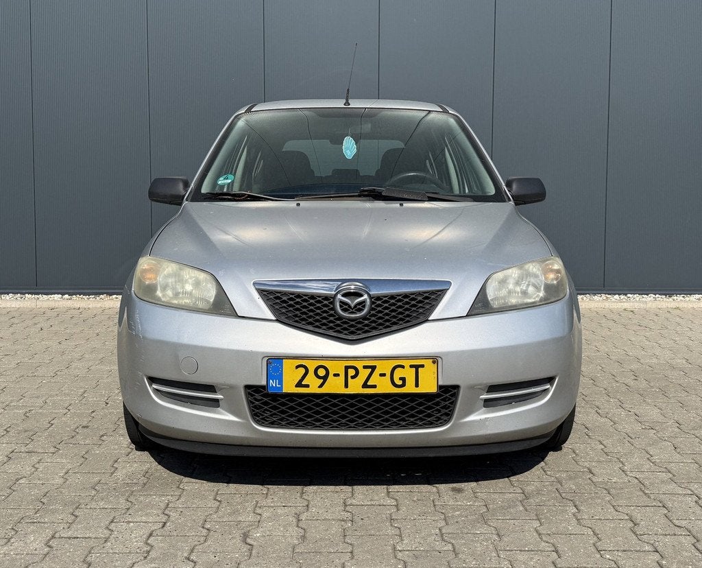 Mazda 2 1.4 Exclusive Airco Trekhaak Handel of Export, Voorwielaandrijving, 1025 kg, Zwart, 4 cilinders
