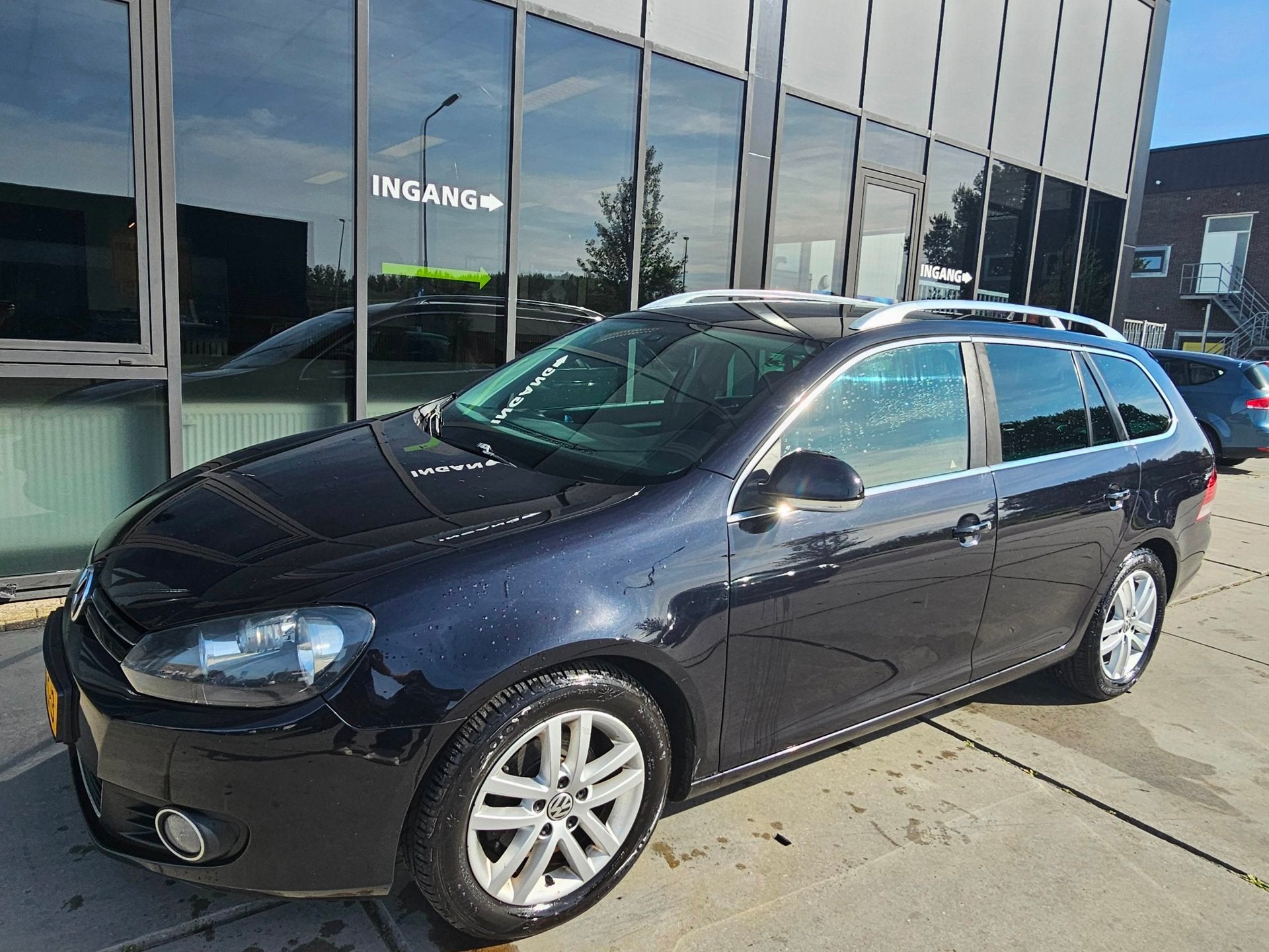 Volkswagen Golf Variant 1.6 TDI Highline BlueMotion - Leer-, Voorwielaandrijving, Euro 5, Zwart, Zwart