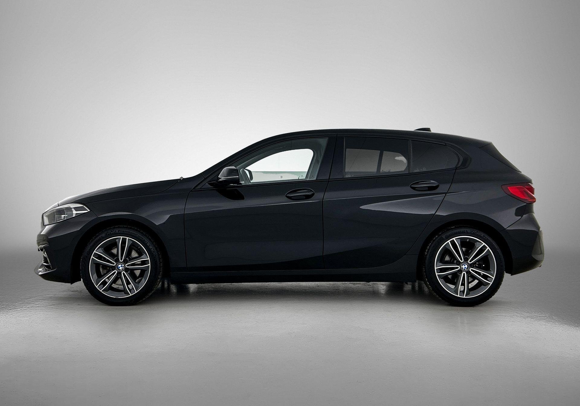 BMW 1-serie 118i Executive Edition, 12 maanden, Gebruikt, Leder en Stof, Zwart