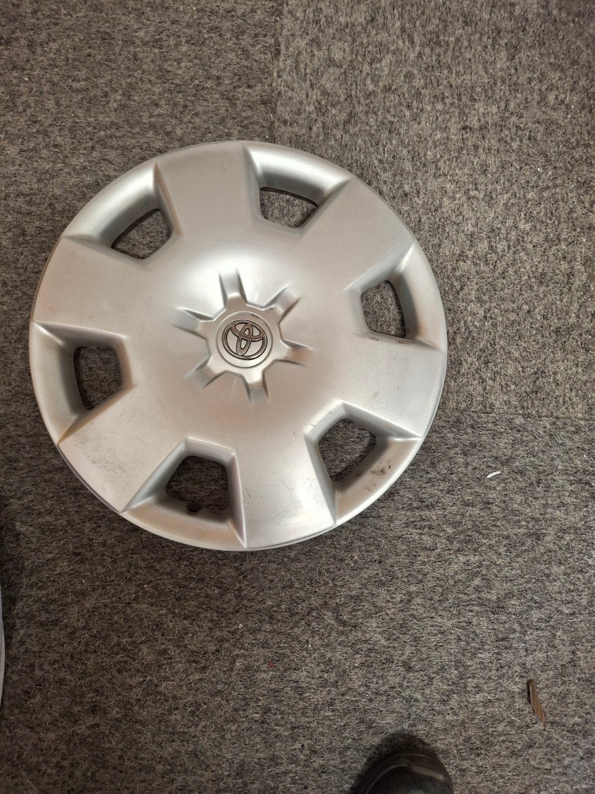 4 originele Toyota wieldoppen 15 inch, Ophalen of Verzenden