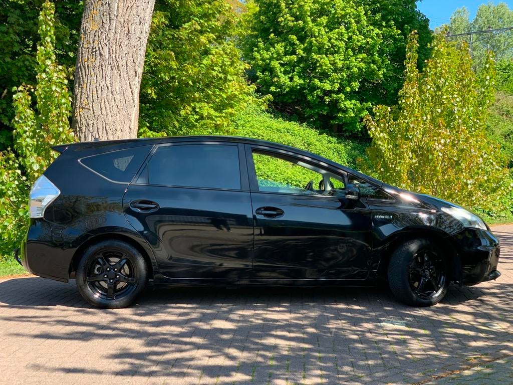 Toyota Prius Wagon 1.8 Aspiration 96g PANO HUD CLIMA 7 PERS, Auto's, Toyota, Euro 5, Gebruikt, 4 cilinders, 7 stoelen