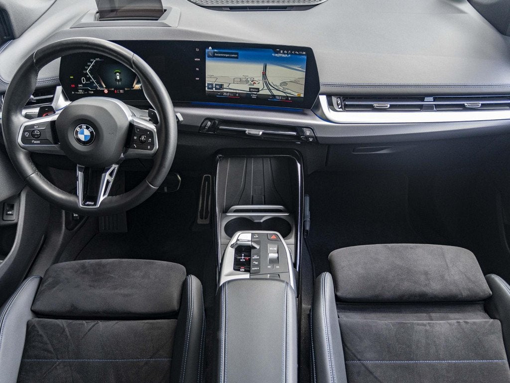 BMW 2 Serie Active Tourer 218i | M Sportpakket | Innovation, Auto's, BMW, Gebruikt, Met garantie (alle), 1445 kg, Wit