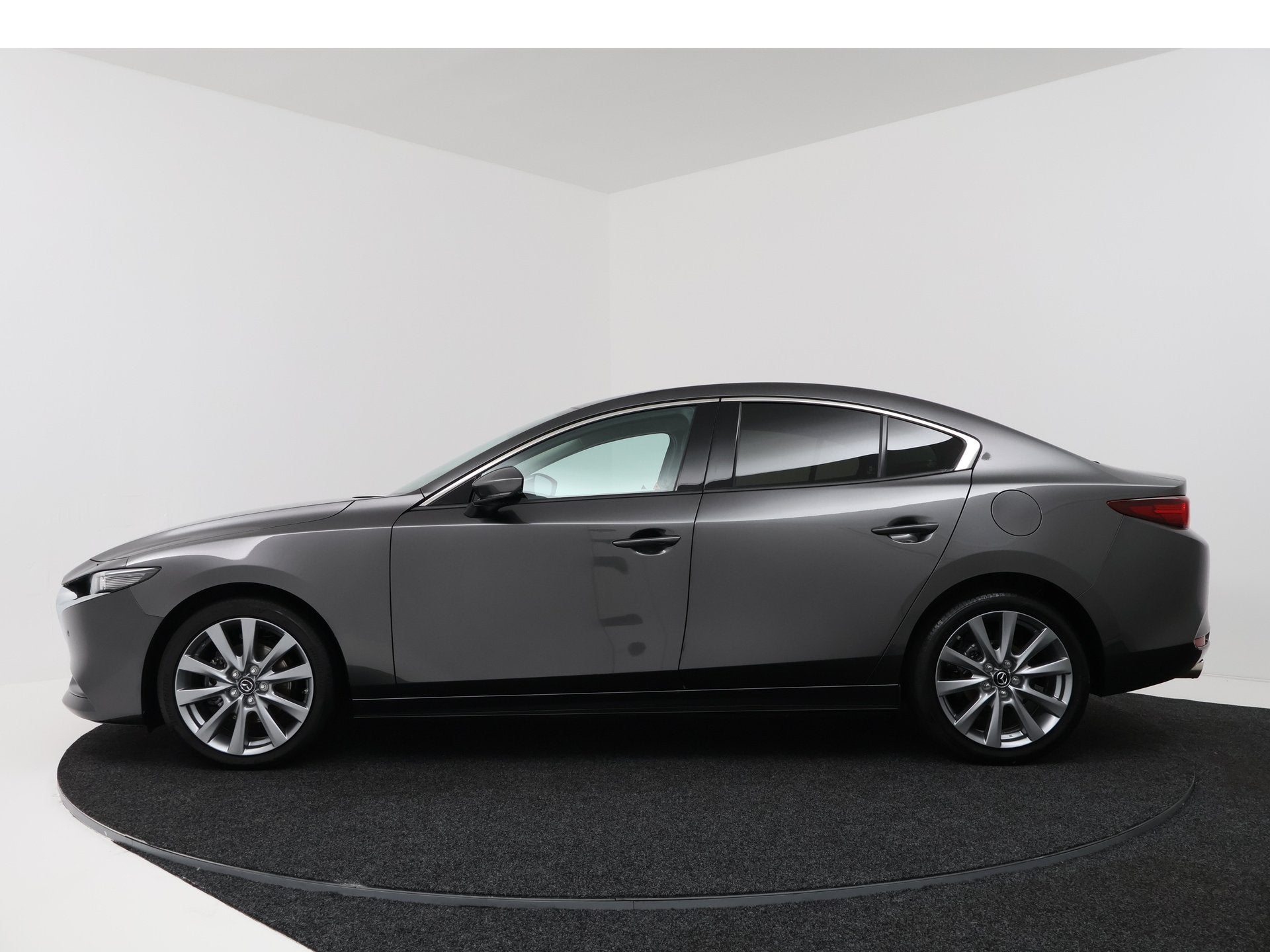 Mazda 3 2.0 e-SkyActiv-G M Hybrid 150 Exclusive-line Bose en, Auto's, Voorwielaandrijving, Gebruikt, 4 cilinders, Automatische klimaatregeling