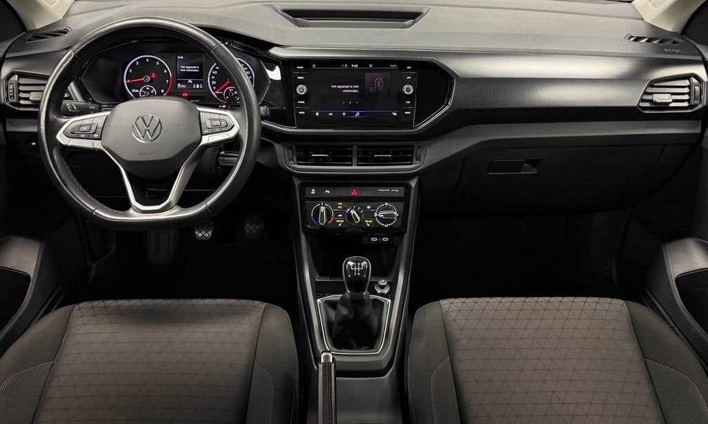 Volkswagen T-Cross 1.0 TSI Life*Navi*Carplay*Stoelverw*Adapt, Auto's, Voorwielaandrijving, Gebruikt, Zwart, Bedrijf