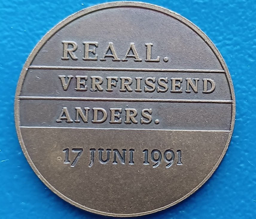 Penning "REAAL. VERFRISSEND ANDERS." - 1991, Postzegels en Munten, Penningen en Medailles, Verzenden, Brons, Nederland