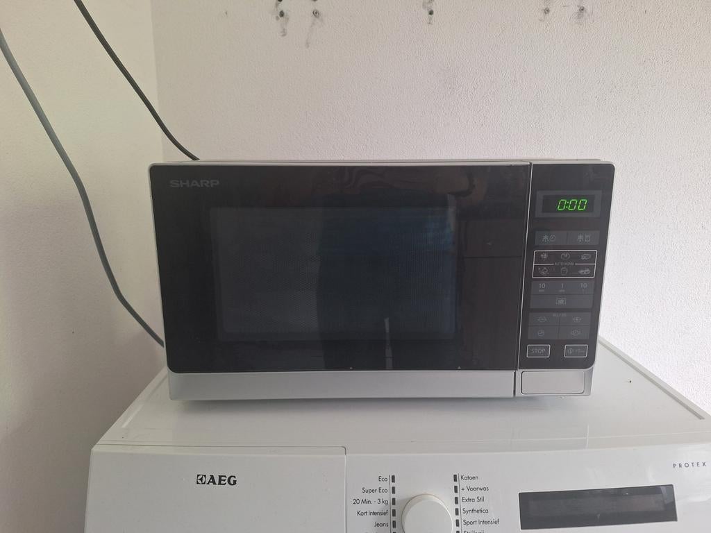 Sharp magnetron met grill functie, Ophalen, Combimagnetron, Grill, Zo goed als nieuw