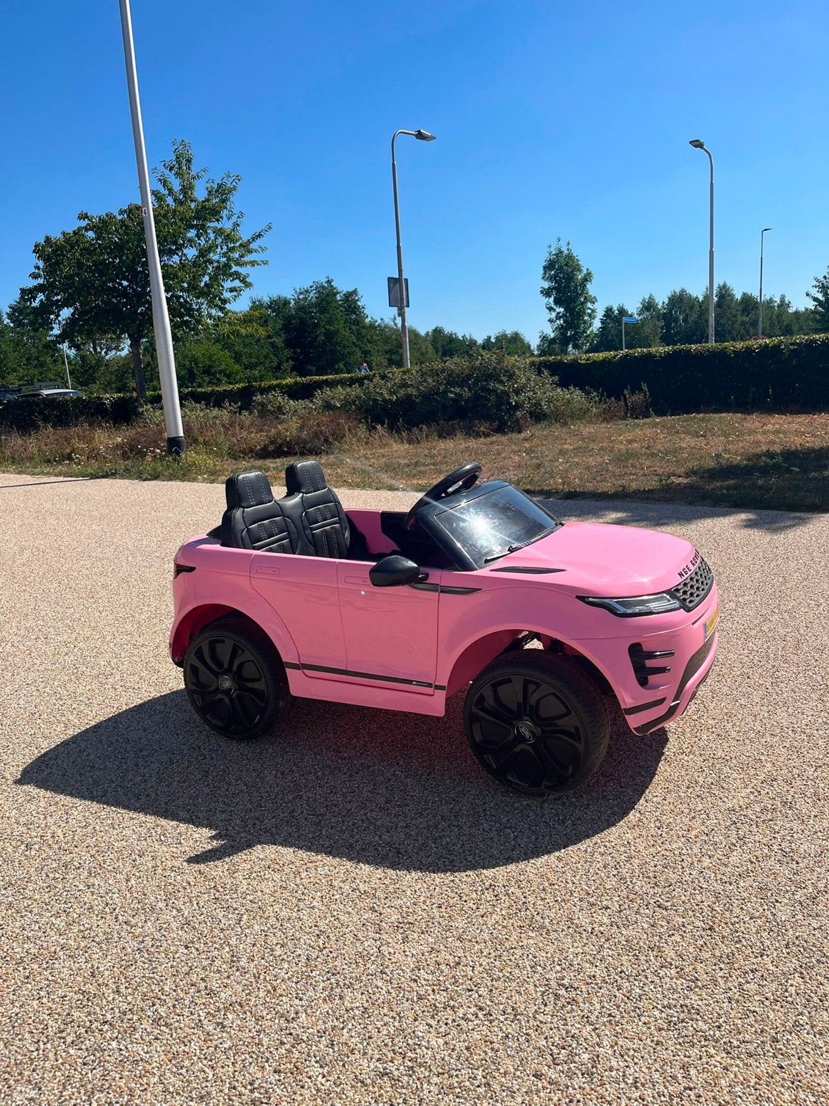 Roze Range Rover Evoque Kinderauto 12V met Afstandsbediening, Ophalen, Zo goed als nieuw