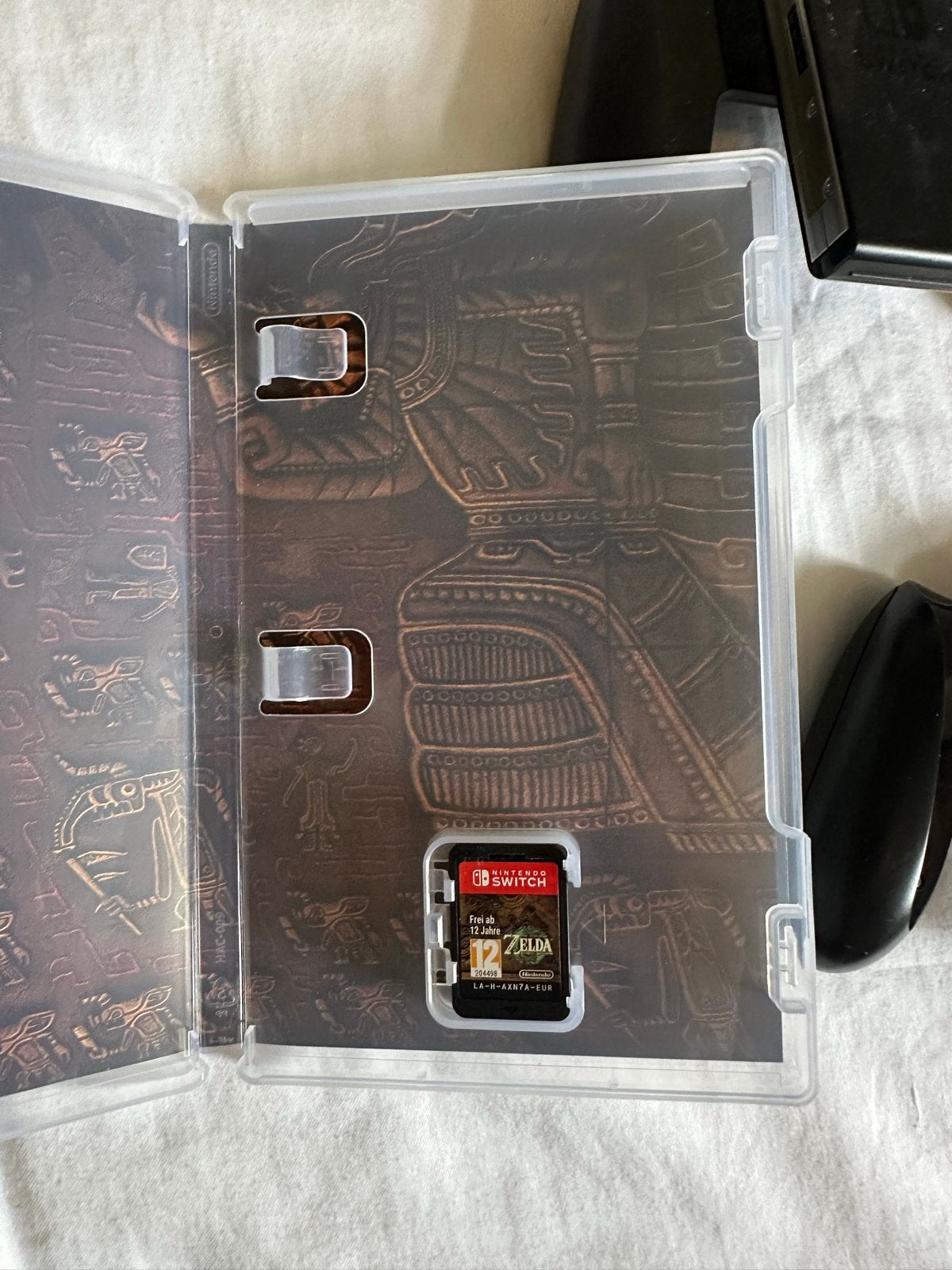Foto 7 van Nintendo Switch OLED met 3 games en accessoires