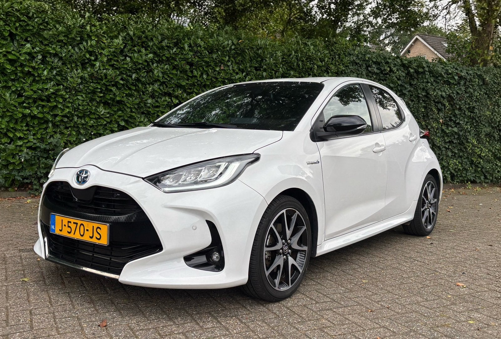 Toyota Yaris 1.5 Hybrid 116pk CVT 2020 Wit automaat 40885 km, 450 kg, Zwart, Dealer onderhouden, Yaris