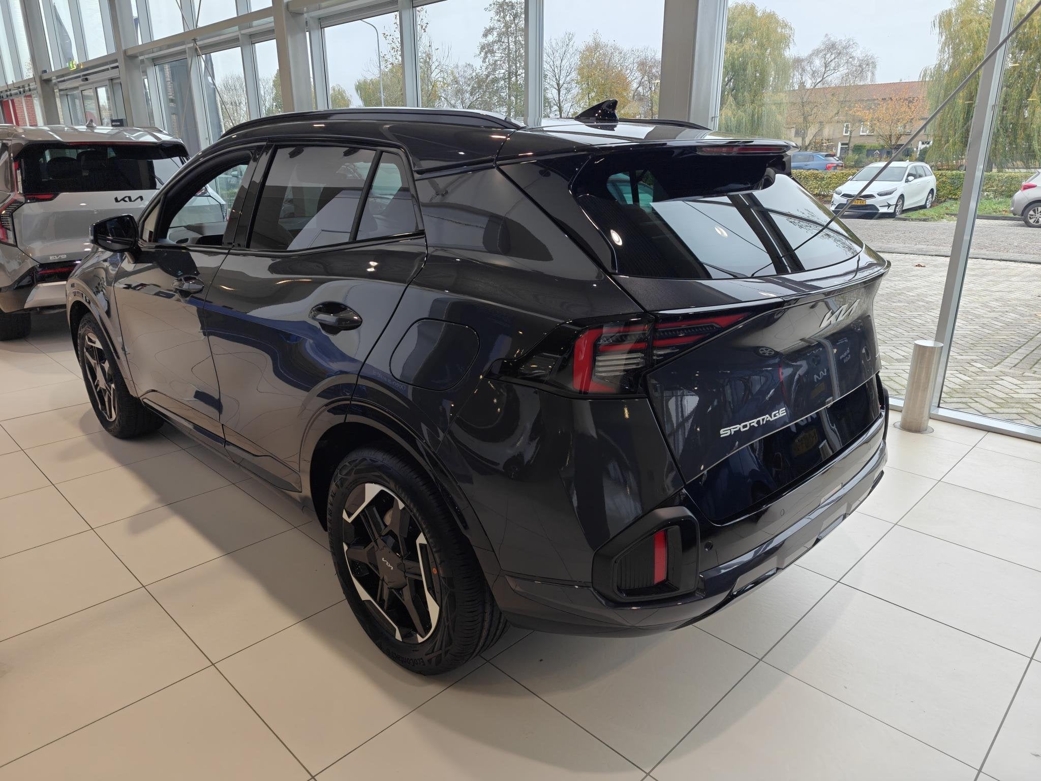 Kia Sportage 1.6 T-GDi Hybrid GT-Line | Schuif-/Kanteldak |, Stof, Euro 6, 4 cilinders, Bedrijf