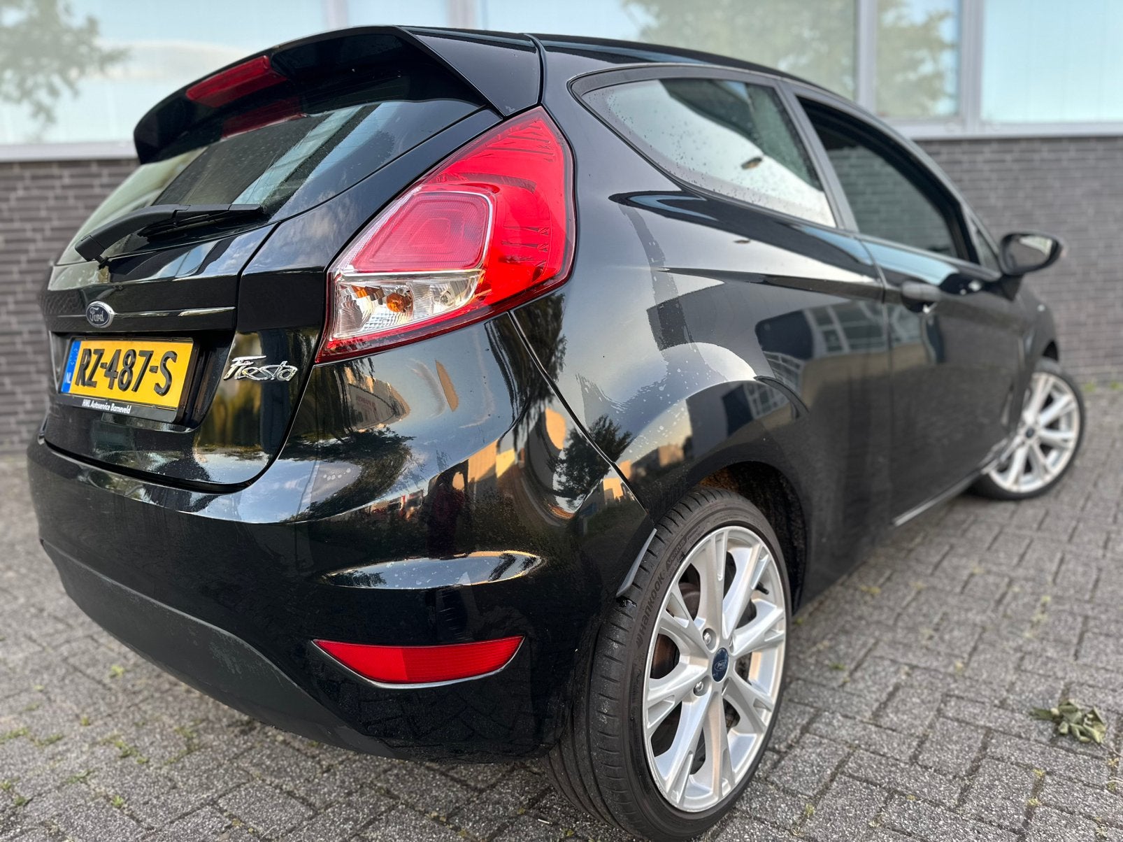 Foto 11 van Ford Fiësta 1.25 44KW 3DR 2014 Zwart/17INCH/CRPLY/NW ONDRHD