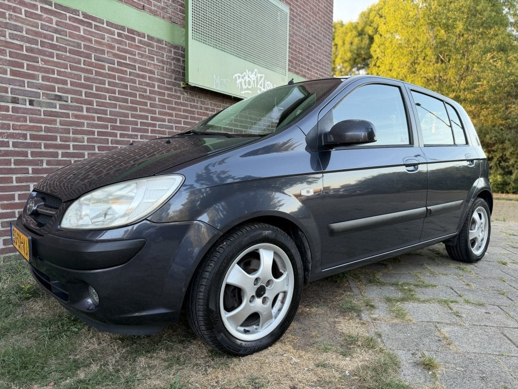 Hyundai Getz 1.4i World C-ed.*2006*Airco|Cruise|Lmv|T-haak, Auto's, Hyundai, Zwart, 4 cilinders, Origineel Nederlands, Bedrijf