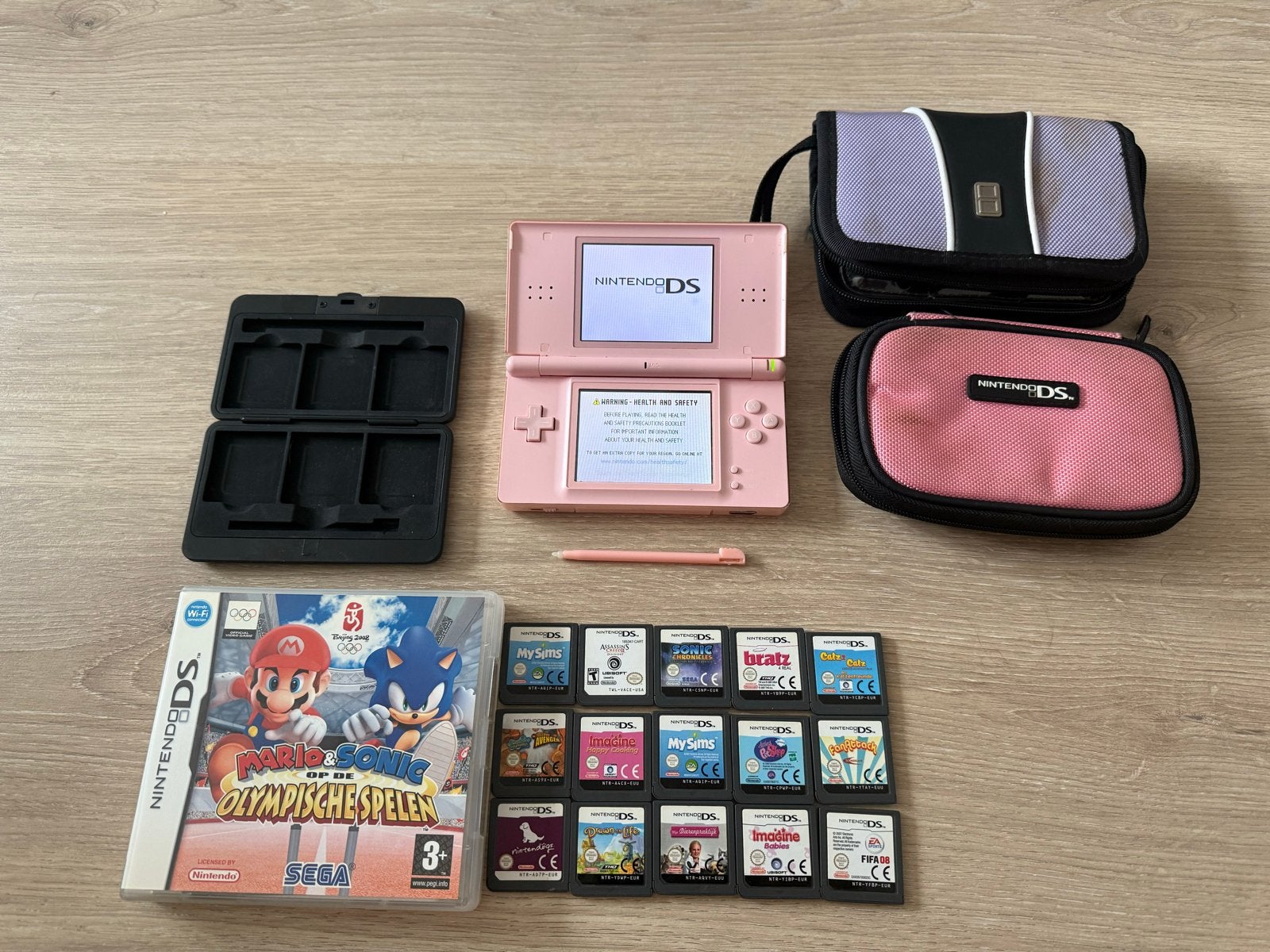 DS Lite + 16 games!, Met games, Ophalen of Verzenden, Zo goed als nieuw, Roze