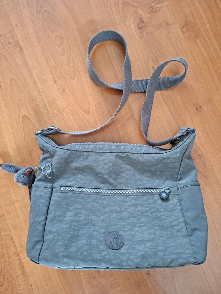 Kipling Dames Schoudertas Grijs met Aapje Jamie, Ophalen of Verzenden, Zo goed als nieuw, Grijs, Kipling