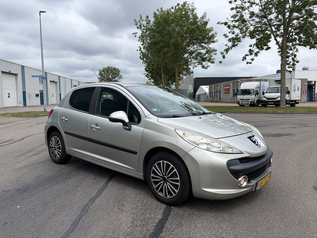 Peugeot 207 1.4 VTi X-line 100 PK. (bj 2009), Auto's, Voorwielaandrijving, Stof, Gebruikt, Zwart