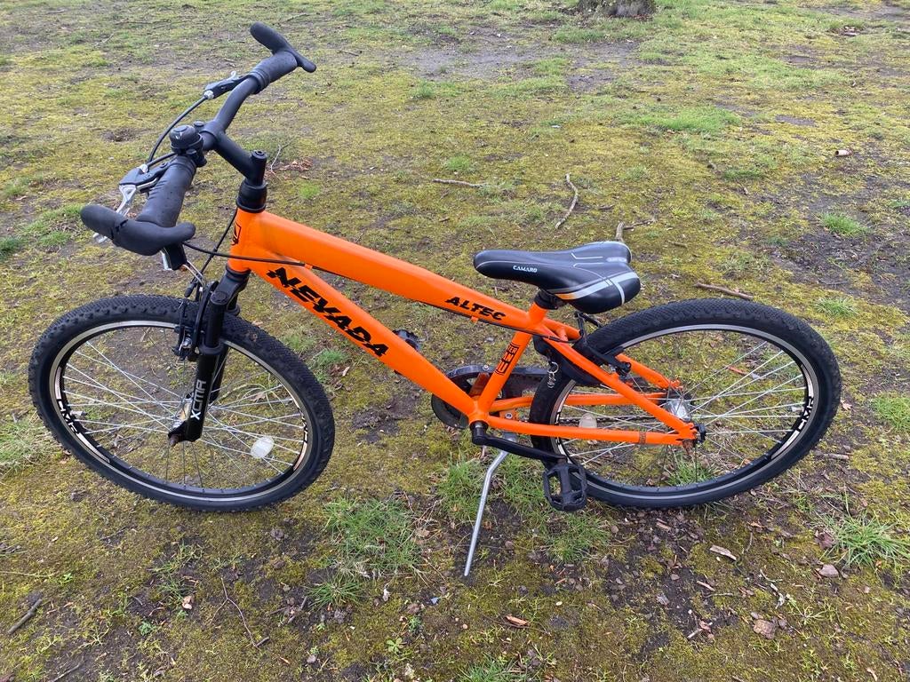 Nevada oranje fiets, Ophalen, Gebruikt, Staal, 24 inch of meer