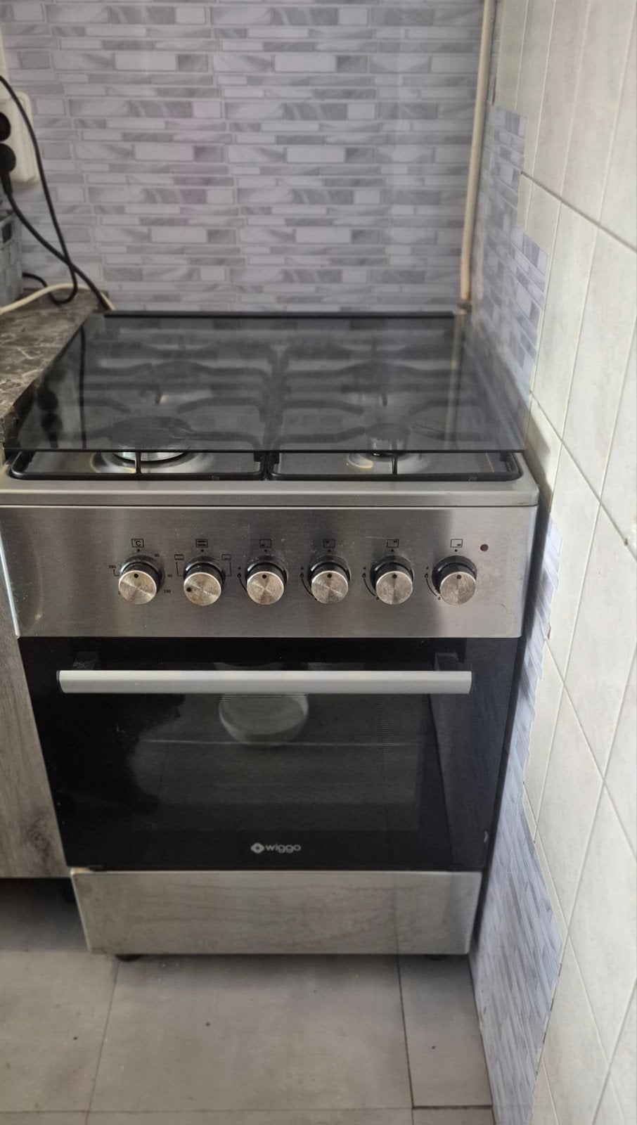 Wiggo WO-E603R gasfornuis met elektrische oven (2019), Witgoed en Apparatuur, Fornuizen, Ophalen, Gebruikt, 4 kookzones, Gas