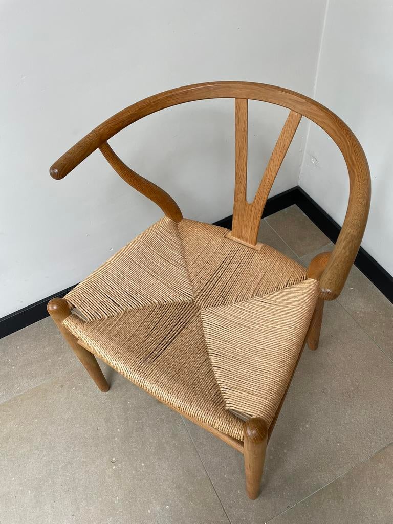 Set van 4 Carl Hansen Wishbone chairs, Huis en Inrichting, Ophalen of Verzenden, Zo goed als nieuw, Bruin, Hout