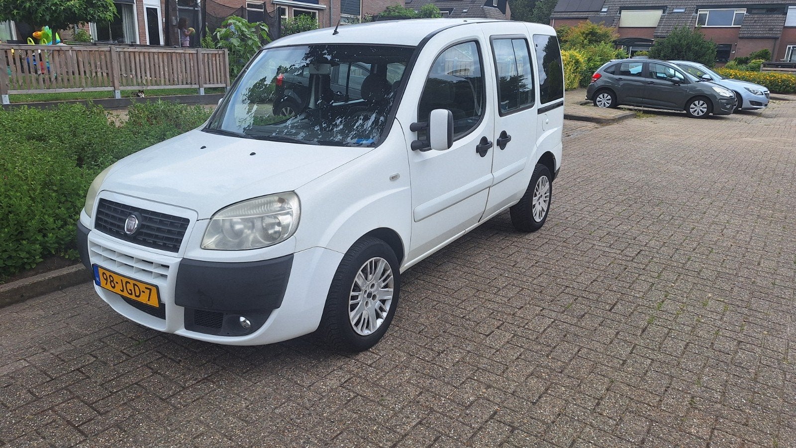 Fiat Doblo 1.4 57KW 2009 Wit 7 persoons, Voorwielaandrijving, Stof, 7 stoelen, Wit