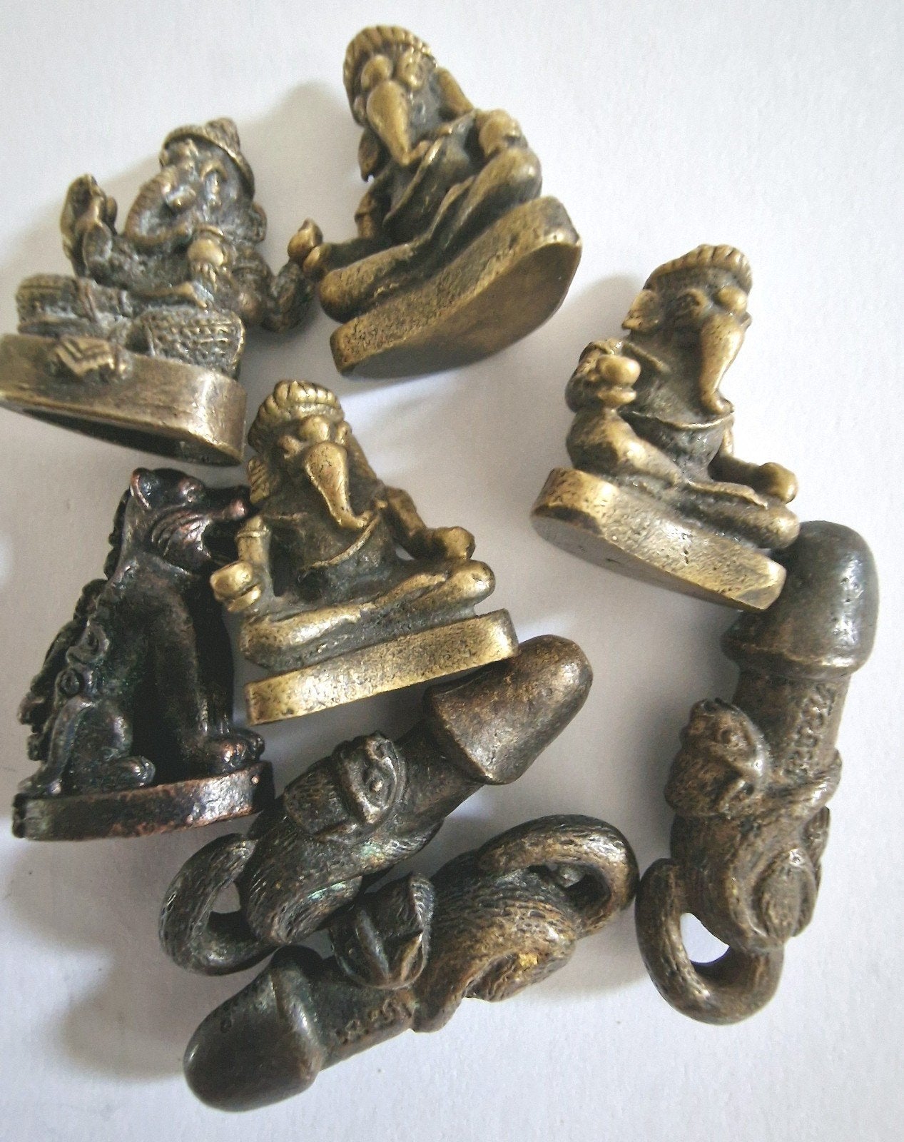Set van 7 antieke Thaise amuletten, Ophalen of Verzenden