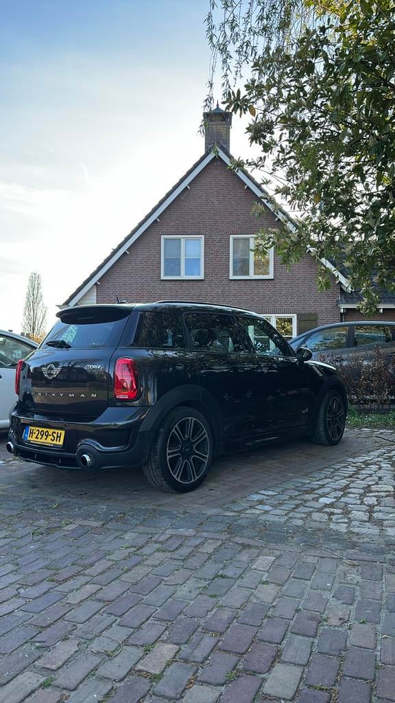 Mini Countryman cooper S 1.6 184pk All4 Aut. 2014 Zwart, Auto's, 1380 kg, Zwart, Zwart, Leder