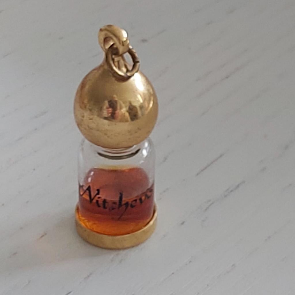 Parfum kettinghanger van Juvena Nitchevo, Ophalen of Verzenden, Zo goed als nieuw, Miniatuur, Gevuld