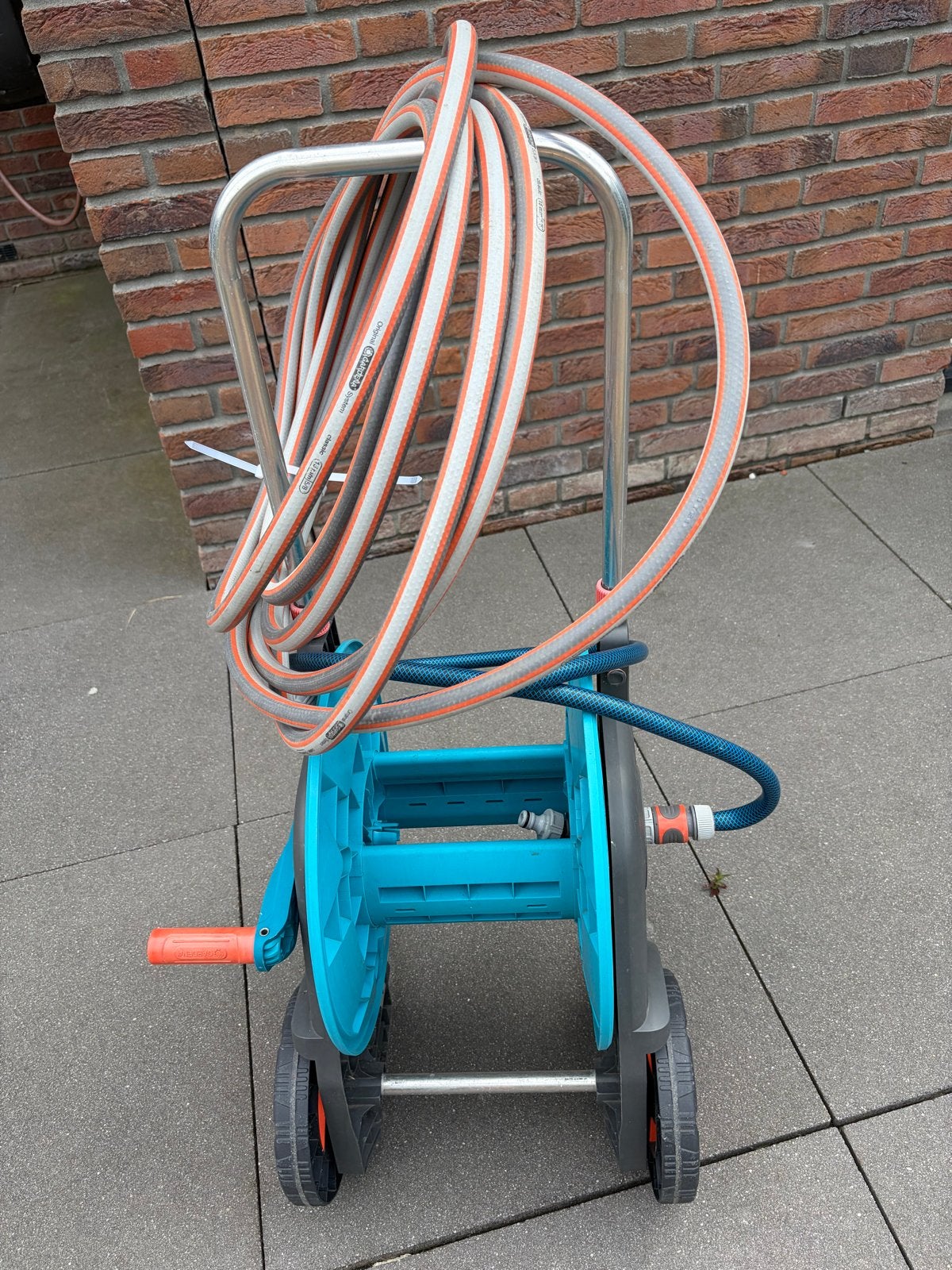 Gardena tuinslanghaspel met 7 meter slang, Tuin en Terras, Ophalen, Zo goed als nieuw, Tuinslanghaspel