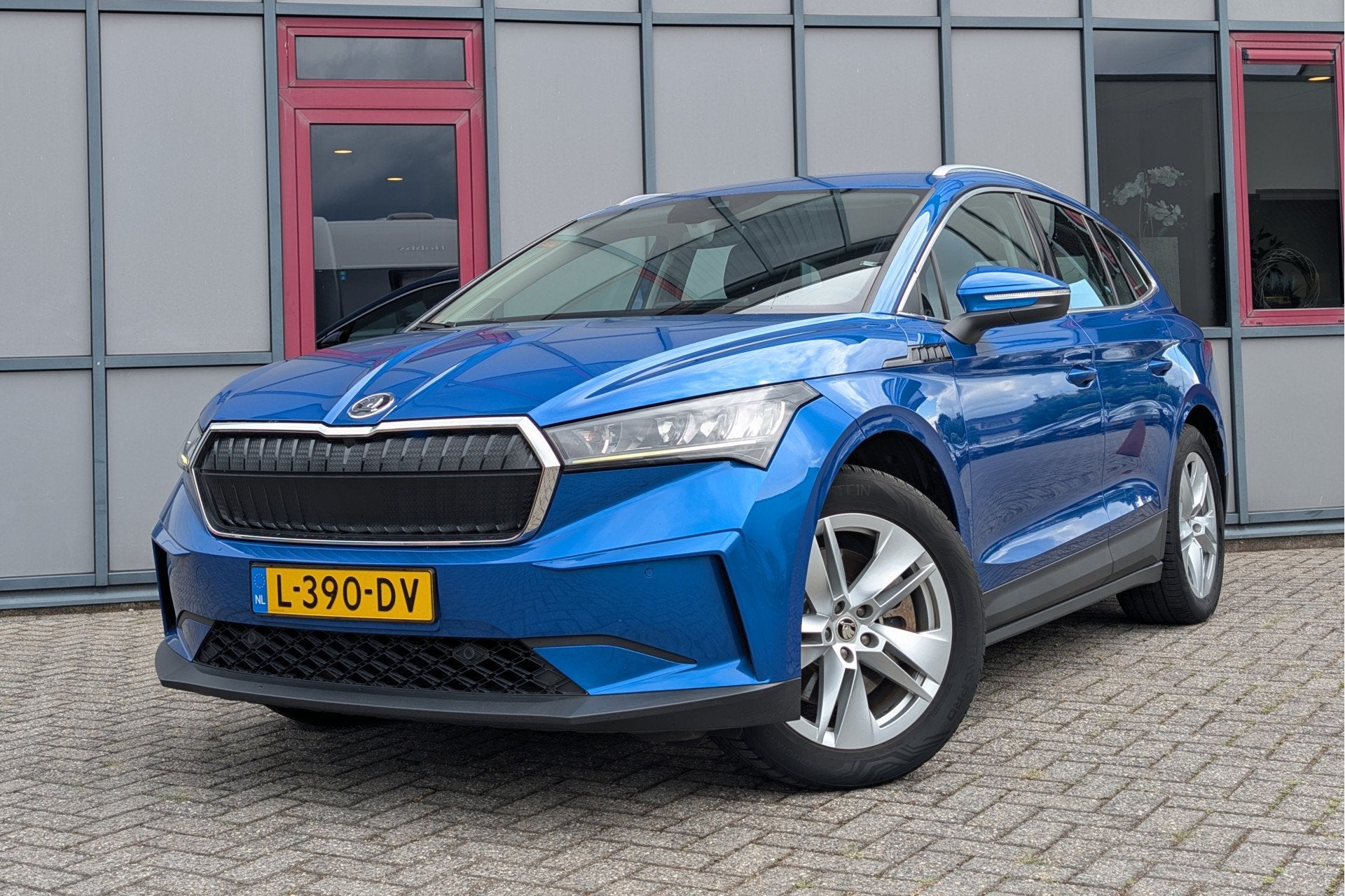Skoda Enyaq iV 80 SOH 91% Trekhaak Warmtepomp (bj 2021), Auto's, Skoda, Automaat, Dealer onderhouden, Achterwielaandrijving, Gebruikt