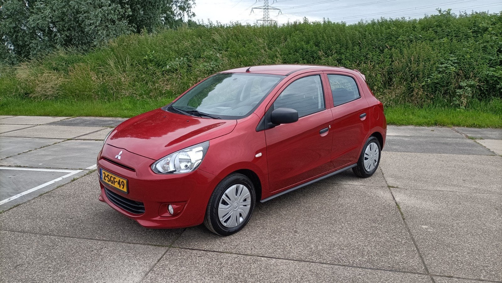 Mitsubishi Space Star 1.0 MPI 52KW 2013 Rood, Auto's, Voorwielaandrijving, Stof, Origineel Nederlands, Bedrijf